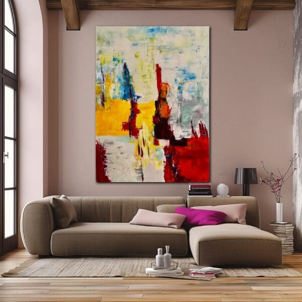 A living room with a couch and a painting on the wall