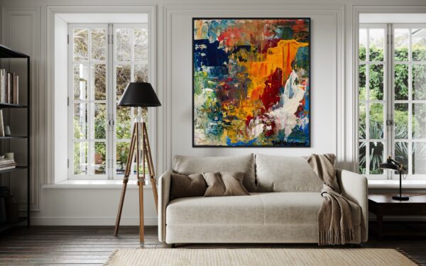 A living room with a couch and a lamp