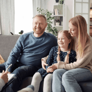 Happy family in therapy session.