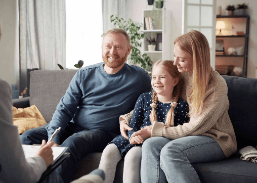 Happy family in therapy session.