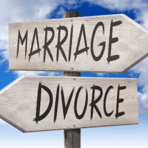 Directional sign showing marriage counseling versus divorce decision path